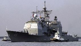 Protests greet U.S. cruiser on call at Osaka port